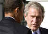 President George W. Bush talks with President-elect Barack Obama at the White House on November 10, 2008.