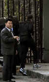 Barack Obama has his back to the cameras as he enters a Chicago gym on November 13, 2008.