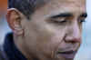 Barack Obama talks to reporters about the Mumbai India terrorist attacks at a Chicago food bank on November 26, 2008.