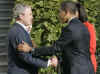 George and Laura Bush greet Barack and Michelle Obama at the White House on November 10, 2008.