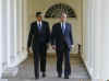 President George W. Bush talks with President-elect Barack Obama at the White House on November 10, 2008.