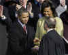 Michelle Obama holds Lincoln Bible from 1861 Inauguration for swearing in ceremony of President Barack Obama.