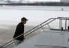 Barack Obama boards a charter plane at Chicago's O'Hare Airport on December 20, 2008. The Obama family is taking a 12-day Christmas vacation in Hawaii.