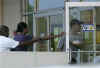 Michelle and Barack Obama arrive at the Semper Fit gym at the Kaneohe Maine Corps Base in Kailua, Hawaii on December 22, 2008.