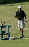 Barack Obama on the driving range at the Mid Pacific Country Club in Kailua Hawaii on December 24, 2008.