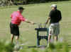 12_24_08_FriendEricWhitaker_Tap_DrivingRange_KailuaHI_Reuters.jpg (33388 bytes)