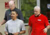 Barack Obama walks with friend Eric Whitaker after workout at the Semper Fit gym on the Kaneohe Bay Marine Corps Base in Kailua, Hawaii on December 28, 2008.