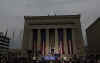 Obama delivers a speech to thousands of supporters in Baltimore. Barack and Michelle Obama, and Joe and Jill Biden, arrive via train in Baltimore. Obama gives a speech at the Baltimore City Hall in the War Memorial Plaza and then continues his journey to Washington and his temporary residence at Blair House. Michele Obama celebrated her 45th birthday on January 17, 2009. Michele Obama was presented a birthday cake on the train.