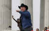 Garth Brooks entertains at the Official Opening Inaugural Celebration at the Lincoln Memorial on January 18, 2009. Barack and Michelle Obama and Joe and Jill Biden attend an inaugural ceremony and concert at the Lincoln Memorial. Biden and Obama delivered short speeches at the Lincoln Memorial. Obama said Lincoln  is "the man who made this possible." Thousands attend Barack Obama's speech and the star-filled concert.