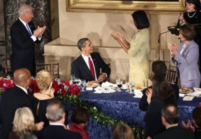 President Barack Obama is introduced by First Lady Michelle Obama at the Inaugural Luncheon at Statuary Hall at the US Capitol. The first course of the Inauguration Luncheon is be served on replicas of Lincoln china selected by Lincoln's wife Mary Todd Lincoln.