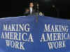 President Barack Obama is welcomed to the stage of the Harborside Event Center in Fort Meyers, Florida by Florida Governor Charlie Crist on February 10, 2009. President Obama spoke to the crowd then answered questions.