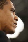 President Barack Obama is welcomed to the stage of the Harborside Event Center in Fort Meyers, Florida by Florida Governor Charlie Crist on February 10, 2009. President Obama spoke to the crowd then answered questions.