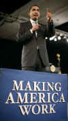 President Barack Obama is welcomed to the stage of the Harborside Event Center in Fort Meyers, Florida by Florida Governor Charlie Crist on February 10, 2009. President Obama spoke to the crowd then answered questions.