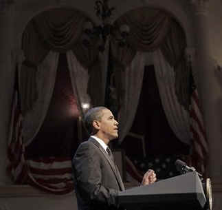 President Barack Obama and First Lady Michelle Obama attend the Grand Re-Opening of Ford's Theatre in Washington on February 11, 2009. President Obama meets a Lincoln actor, receives a copy of the Gettysburg Address, and speaks just below the box where President Abraham Lincoln was shot (photo).