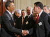 President Obama greets the CEO of Dell Computers. President Barack Obama speaks to the Business Council comprising of the leaders of US corporations to outline President Obama's economic plan set at $787 billion. Obama spoke in the East Room of the White House on February 13, 2009.