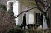 President Obama walks to the Oval Office of the White House after returning from a President's Day weekend at Obama's Chicago home.