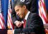 President Barack Obama signs the $787 billion American Recovery and Investment Plan into law at the Denver Museum of Nature and Science.