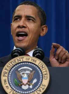 President Obama speaks at the Denver Museum of Science and Nature before signing stimulus bill.