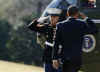 President Barack Obama leaves the Oval Office to board Marine One enroute to Air Force One for a trip to Denver, Colorado to sign the economic stimulus package.