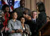 First Lady Michelle Obama visits the Department of Agriculture and thanks the department for their service. The First Lady presents Agriculture Secretary Tom Vilsack and the department staff a seedling from a White House magnolia tree.