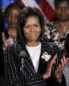 First Lady Michelle Obama visits the Department of Agriculture and thanks the department for their service. The First Lady presents Agriculture Secretary Tom Vilsack and the department staff a seedling from a White House magnolia tree.