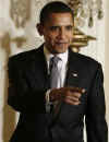 President Obama arrives to speak to America's city mayors at the Conference of Mayors held in the East Room of the White House. President Obama discussed the responsibility of mayors to ensure stimulus money is spent without corruption.