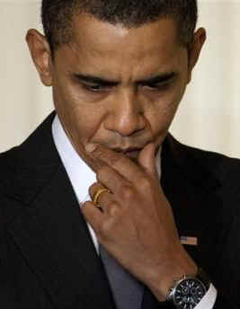 President Obama waits to speak to America's city mayors at the Conference of Mayors held in the East Room of the White House. President Obama discussed the responsibility of mayors to ensure stimulus money is spent without corruption.