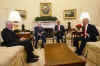 President Barack Obama meets with former President Bill Clinton, Senator Edward M. Kennedy, and Vice President Joe Biden in the Oval Office of the White House.