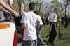 President Barack Obama plants trees with volunteers at the Kenilworth Aquatic Gardens.