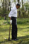 President Barack Obama plants trees with volunteers at the Kenilworth Aquatic Gardens.