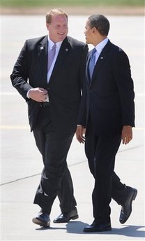 President Obama arrives on Air Force One in Des Moines, Iowa and is greeted by Iowa Governor Chet Culver.