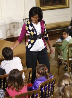 First Lady Michelle Obama speaks to the children of White House staffers at the Take Your Kids To Work Day in the East Room of the White House on April 23, 2009.