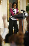 First Lady Michelle Obama speaks to the children of White House staffers at the Take Your Kids To Work Day in the East Room of the White House on April 23, 2009.