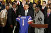 The Gators football team presented President Obama with a Championship football and a personalized team jersey.