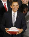 The Gators football team presented President Obama with a Championship football and a personalized team jersey.