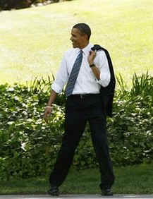 Watch the White House YouTube of Obama and the Huskies Shoot Hoops on April 27, 2009. Photo: President Obama returns to Oval Office after shooting hoops with NCAA Huskies.