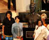 First Lady Michelle Obama, Secretary of State Hillary Clinton, Speaker of the House Nancy Pelosi and other guests join in an unveiling ceremony of the sculpted bust of Sojourner Truth.