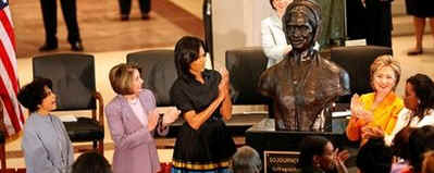 First Lady Michelle Obama, Secretary of State Hillary Clinton, Speaker of the House Nancy Pelosi and other guests join in an unveiling ceremony of the sculpted bust of Sojourner Truth.