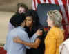 First Lady Michelle Obama, Secretary of State Hillary Clinton, Speaker of the House Nancy Pelosi and other guests join in an unveiling ceremony of the sculpted bust of Sojourner Truth created by Canadian sculptor Artis Lane (photo left).