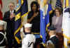 First Lady Michelle Obama, Secretary of State Hillary Clinton, Speaker of the House Nancy Pelosi and other guests join in an unveiling ceremony of the sculpted bust of Sojourner Truth.