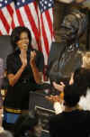 First Lady Michelle Obama, Secretary of State Hillary Clinton, Speaker of the House Nancy Pelosi and other guests join in an unveiling ceremony of the sculpted bust of Sojourner Truth.