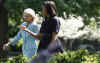 First Lady Michelle Obama and Second Lady Jill Biden arrive at the award ceremony.