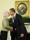 President Barack Obama joins the swearing in ceremony of Kathleen Sebelius as the new Secretary of Health and Human Services in the Oval Office of the White House on April 28, 2009. 