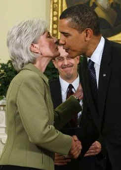 President Barack Obama joins the swearing in ceremony of Kathleen Sebelius as the new Secretary of Health and Human Services in the Oval Office of the White House on April 28, 2009. 