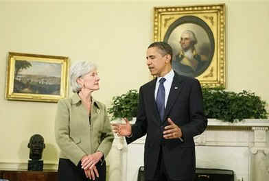 President Barack Obama joins the swearing in ceremony of Kathleen Sebelius as the new Secretary of Health and Human Services in the Oval Office of the White House on April 28, 2009. 