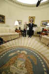 President Barack Obama joins the swearing in ceremony of Kathleen Sebelius as the new Secretary of Health and Human Services in the Oval Office of the White House on April 28, 2009. 