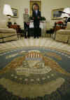 President Barack Obama joins the swearing in ceremony of Kathleen Sebelius as the new Secretary of Health and Human Services in the Oval Office of the White House on April 28, 2009. 