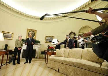 President Barack Obama joins the swearing in ceremony of Kathleen Sebelius as the new Secretary of Health and Human Services in the Oval Office of the White House on April 28, 2009. 