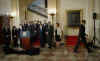 President Barack Obama leaves after speaking on the auto industry in the Grand Foyer of the White House on April 30, 2009.