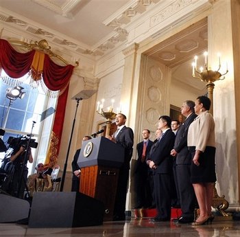 President Barack Obama speaks on the auto industry in the Grand Foyer of the White House on April 30, 2009.